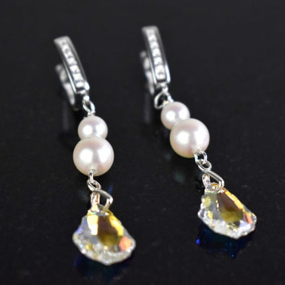 Sterling silver diamante lever back wires hold two freshwater ivory pearls and a sparkling Baroque highest quality Austrian crystal. Colour shown is crystal AB