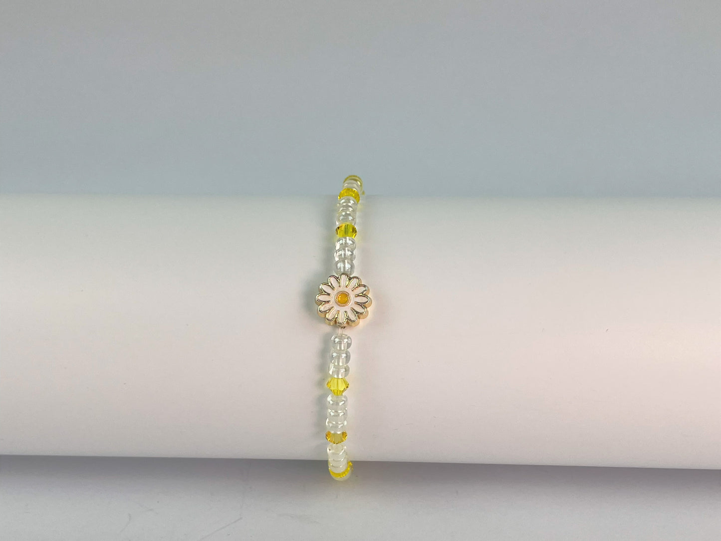 daisy elasticated bracelet clear glass and yellow crystals with centre daisy charm