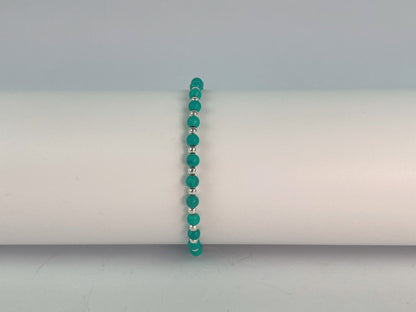 elasticated bracelet of turquoise and silver beads