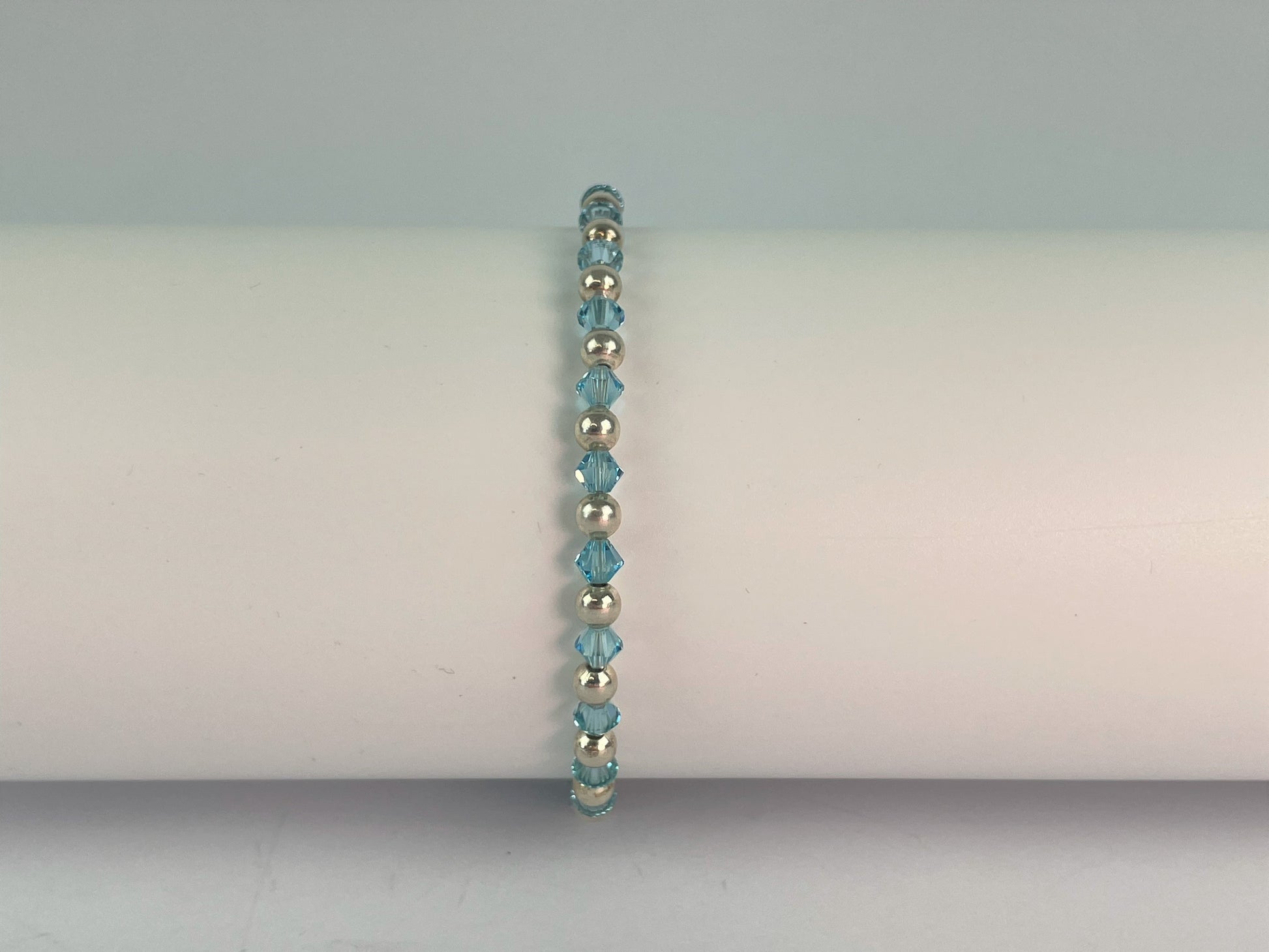 sky blue crystals and silver plated beads make up this pretty blue bracelet.