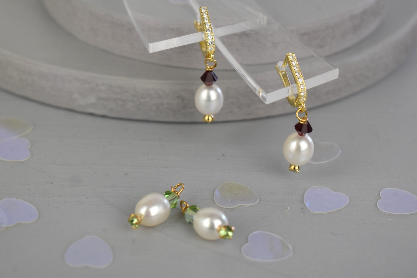 freshwater pearl earrings with peridot Austrian crystals hung from your choice of sterling silver or gold plated ear wires trimmed with diamante