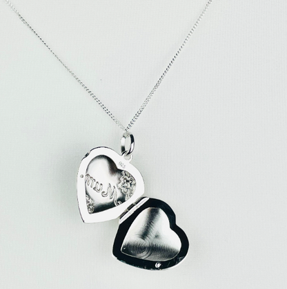 Heart shaped photo locket features delicate flowers engraved on the front, along with Mum. Crafted from high-quality sterling silver, it comes with a 16-18 inch extendable chain