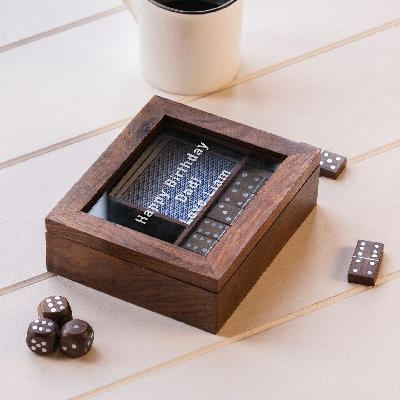 Handcrafted sheesham wood box holding dominos,  playing cards and five dice. Glass lid is engraved witha message of your choice