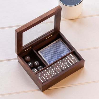Handcrafted sheesham wood box holding dominos, playing cards and five dice. Glass lid is engraved witha message of your choice. open to show content