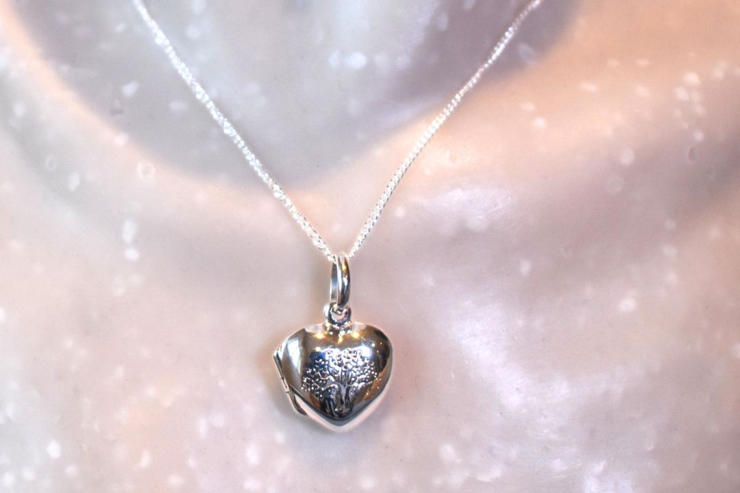 sterling silver heart shaped necklace engraved with family tree