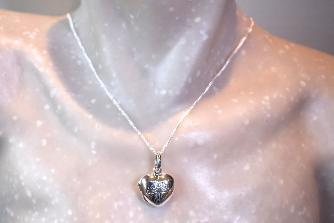 sterling silver heart shaped necklace engraved with family tree