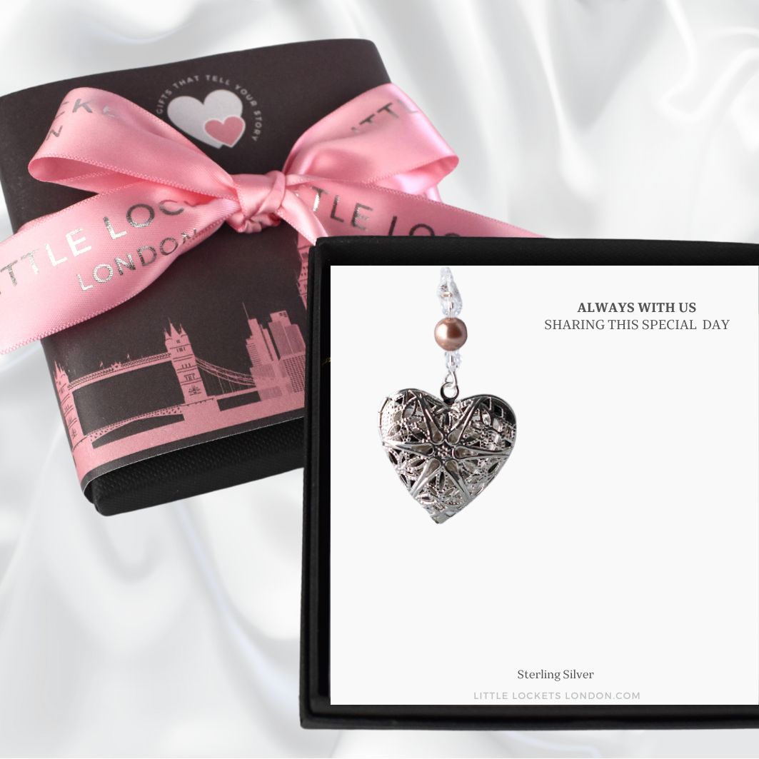 Filigree opening locket with crystals and a pearl in your wedding colours. Shown in gift box with the message "Always with us, sharing this special day". Shown with optional gift wrap