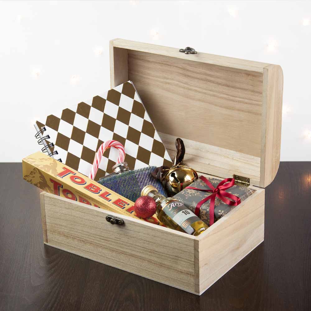 Wooden Christmas Eve Box with engraved bauble design. Personalised with your family name above the words "Christmas Eve Box". Available in two sizes. Larger size shown
