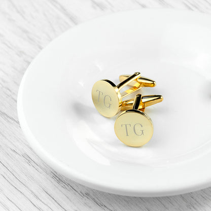Gold plated cufflinks shown with two initial on each link