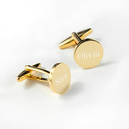 Gold plated circular cufflinks shown with a different name on each link