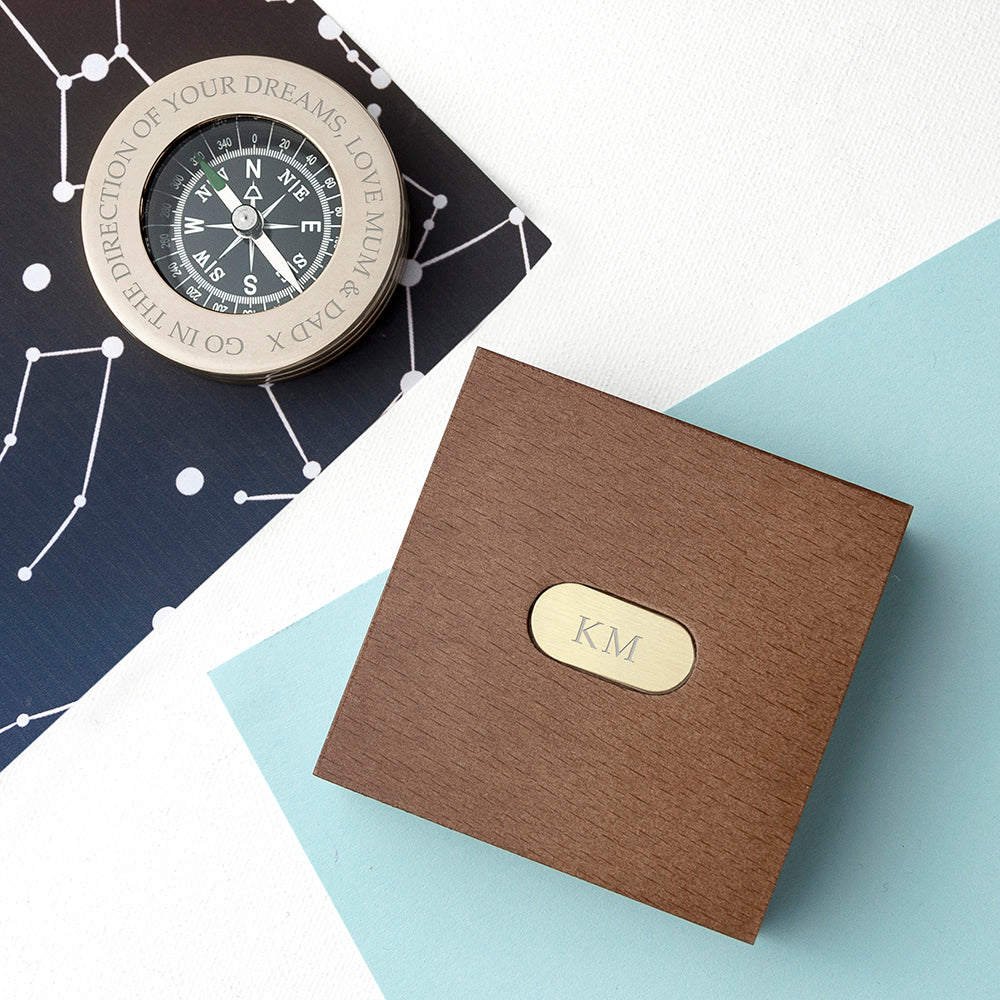 Personalised brass compass engraved with a message of your choice and presented in a mahogany stained box with a brass inset containing up to four characters.