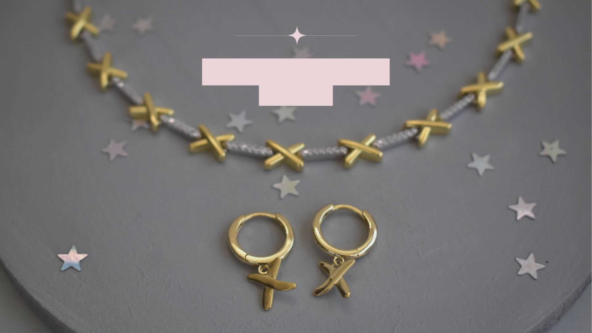 video showing golden kisses necklace and matching hoop earrings