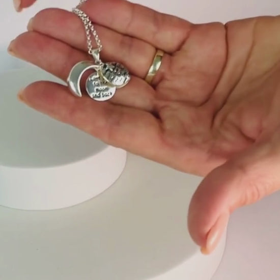 Pretty locket opens to reveal its own special message - love you to the moon and back