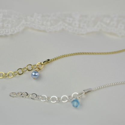 Something Blue anklet available in your choice of sterling silver or sterling silver with gold plating. Choice of blue pearl or blue crystal to finish your anklet.