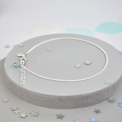 sterling silver curb anklet with tiny blue glass crystal