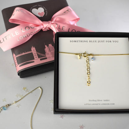 Gold plated version shown gift box and with optional skyline wrap and ribbon in the background.