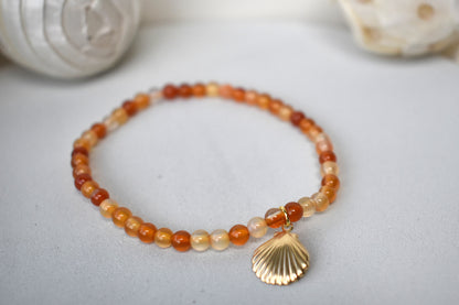 Carnelian elasticated bracelet with sterling silver gold plated shell