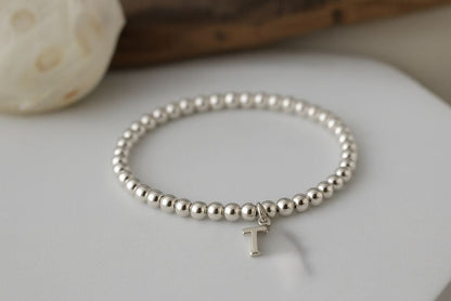 Optional sterling silver initial charm