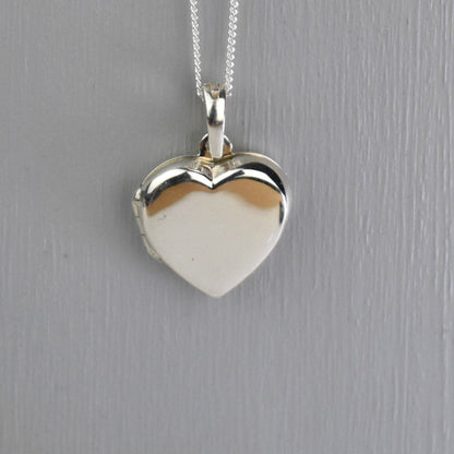 sterling silver heart locket removed from bouquet charm and placed on chain