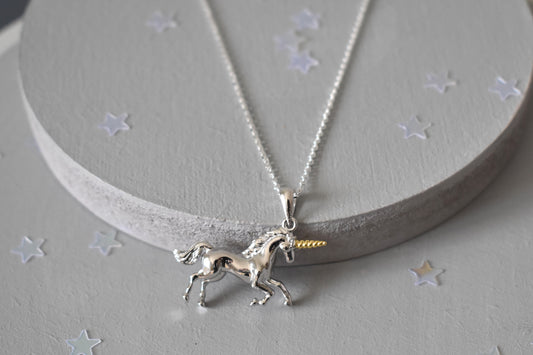 Silver unicorn pendant necklace on a 14" sterling silver chain