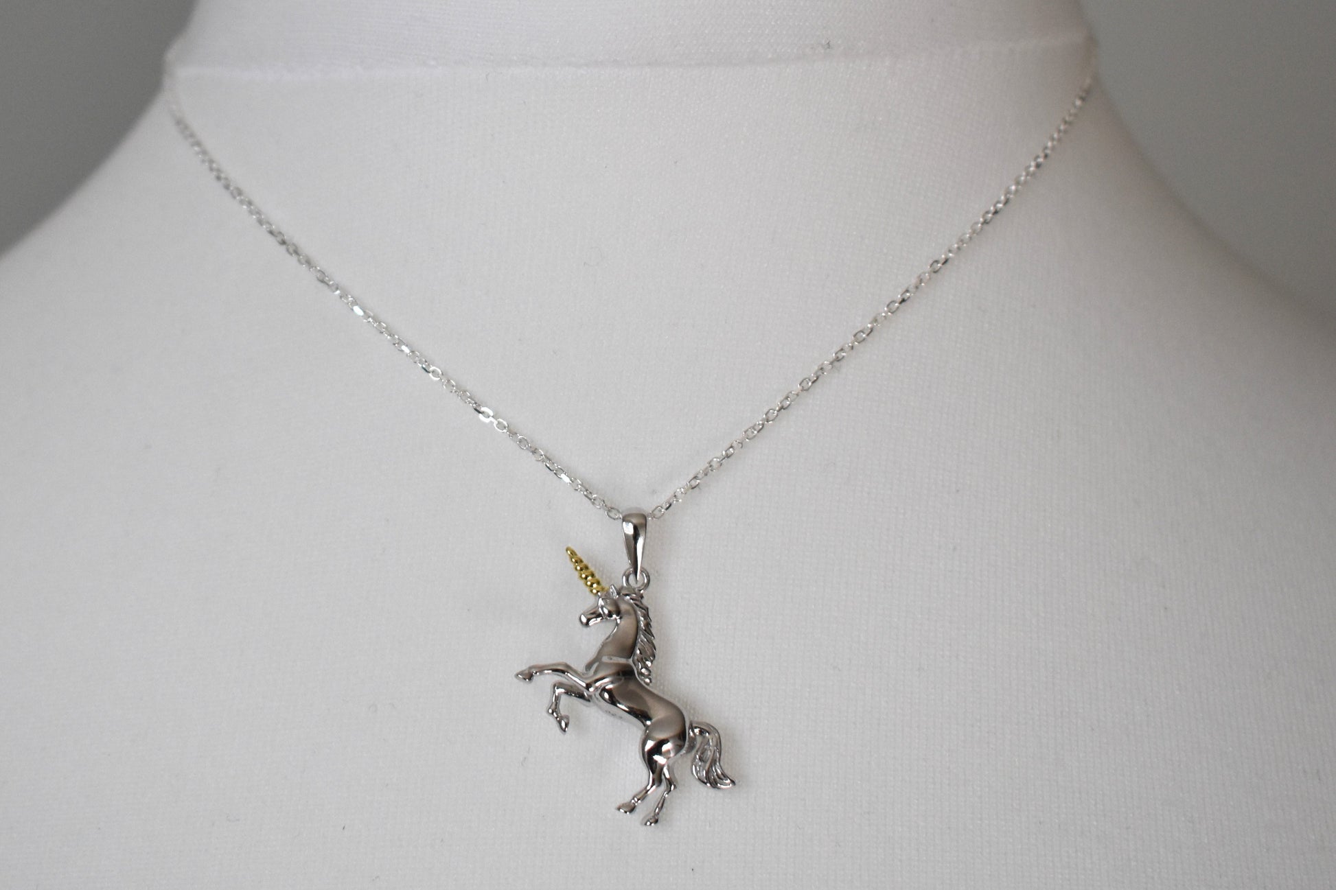 Silver unicorn pendant necklace on a 14" sterling silver chain