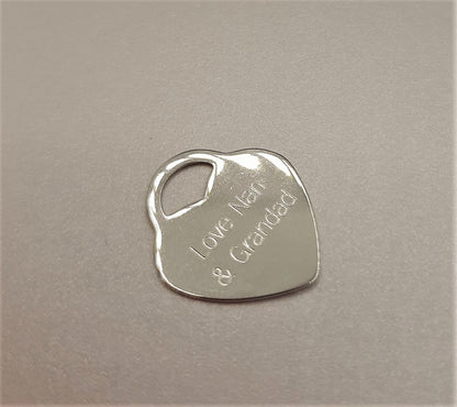 Optional sterling silver heart with message of your choice that can be added to the wedding party memorial locket
