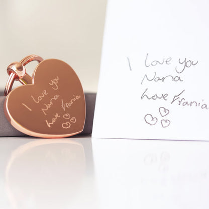 Rose gold metal heart keyring engraved with a handwritten message and drawing of your choice