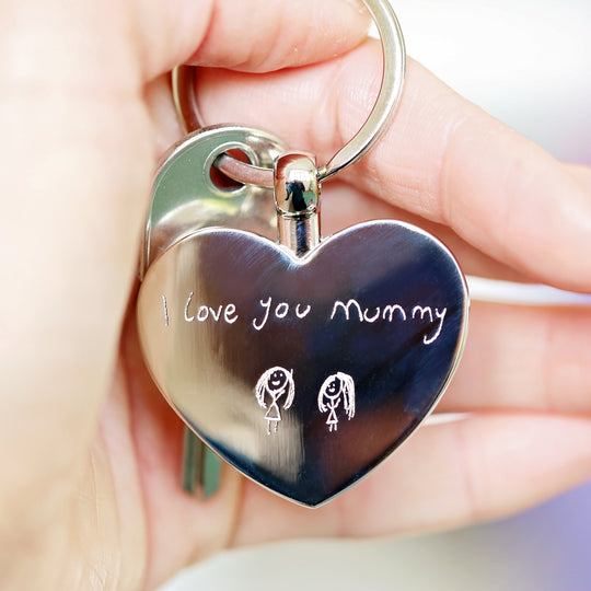 A silver colour keyring engraved with a message in your own handwriting. Add drawings too!