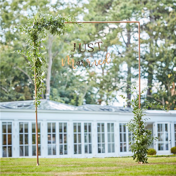 square arch frame shown with foliage and Just Married banner