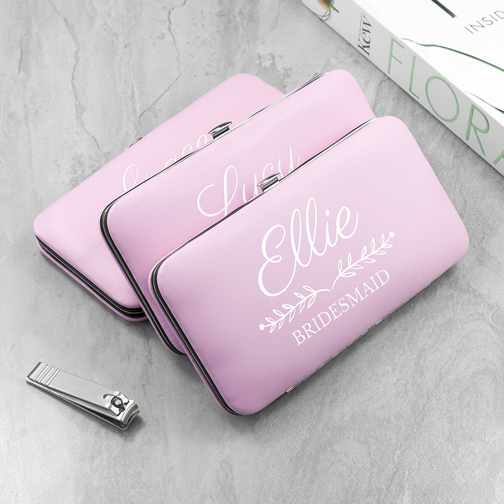 pink manicure set with name and role printed on front 
