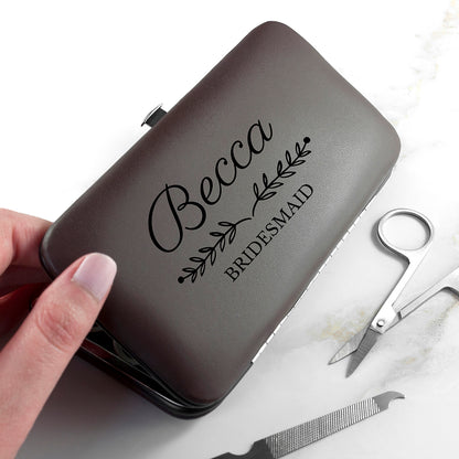 grey manicure set with name and role printed on front