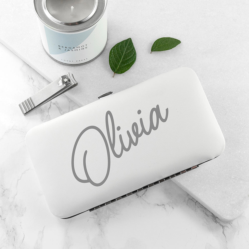 white manicure set with name in script