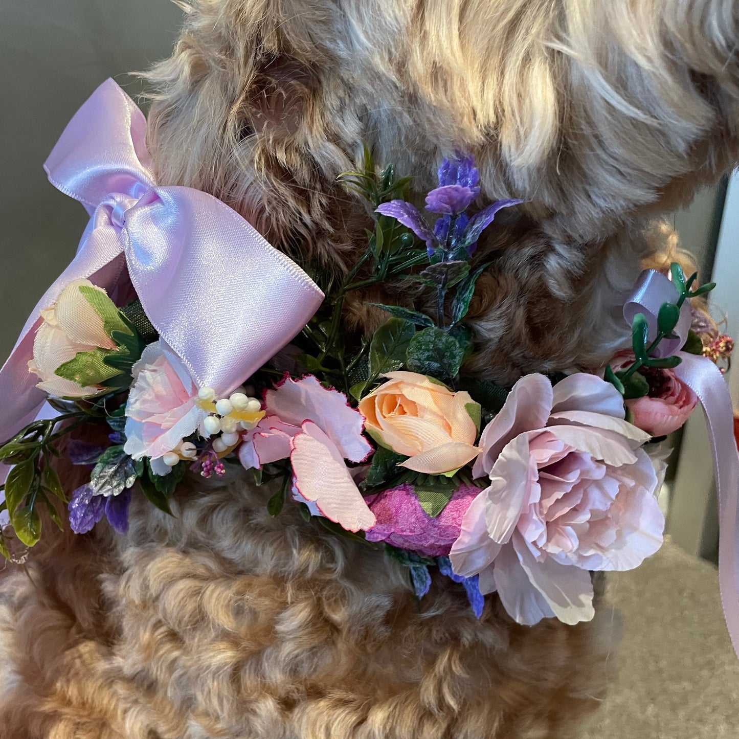 close up of flower dog collar showing quality of silk flowers and hints of greenery