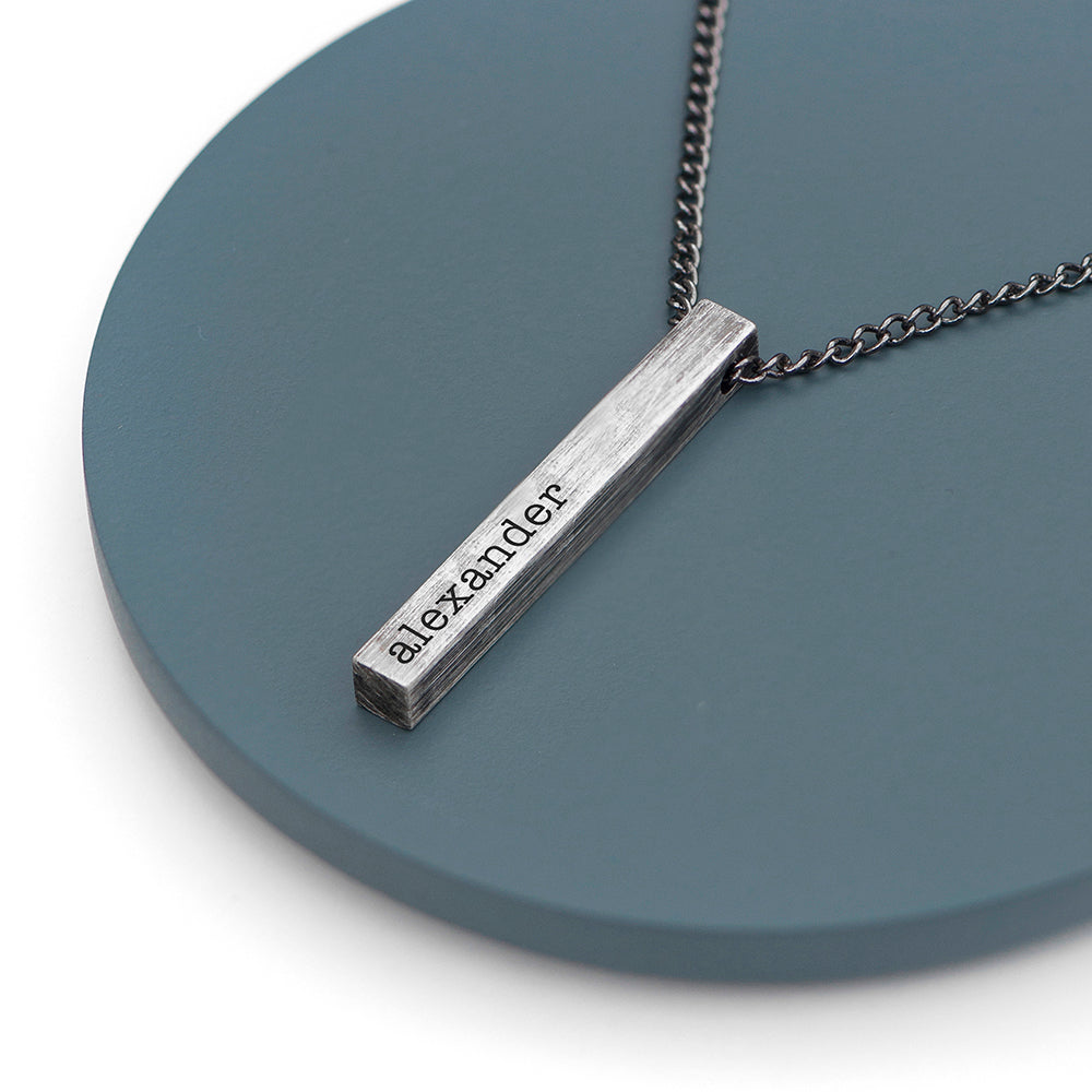 Gunmetal grey bar on gunmetal chain. Bar is engraved with the name of your choice.