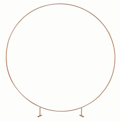 A large copper hoop that is free standing and can be used for flower or balloon displays.