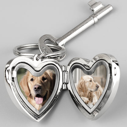 nickel plated opening locket key ring with paw print, engraved with your pet's name, shown open with two photos