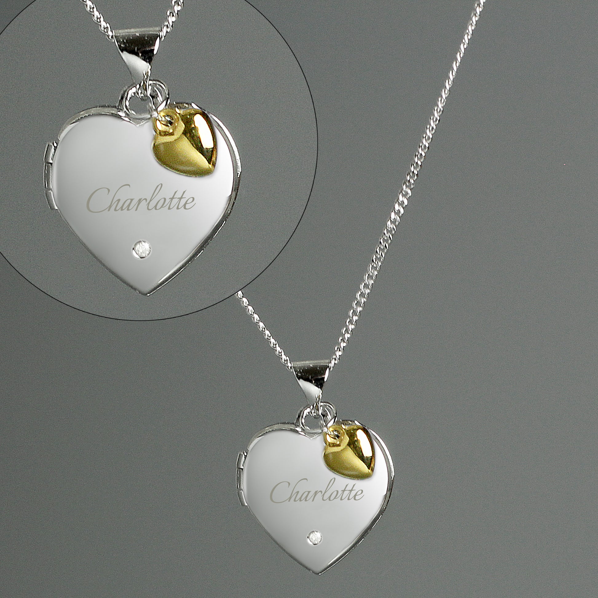 dheart shaped locket with a tiny diamante on the front and engraved with a name of your choice in script font. The locket carries a tiny gold plated heart. The locket can take up to two photos. Sterling silver chain.etail of engraving on personalised locket