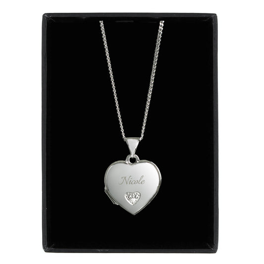 childs sterling silver heart shaped locket engraved with her name and adorned with tiny cubic zircona