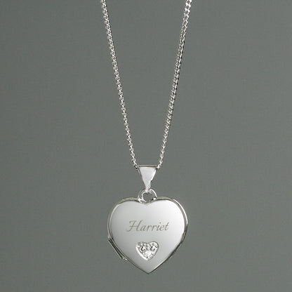 childs  heart shaped sterling silver locket engraved with name