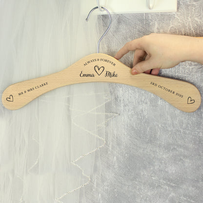 personalised wooden wedding hanger with Bride & Groom's names under the words "Always and Forever" and with a pretty sketched heart between the names. Room for further personalisation on each arm of the hanger.