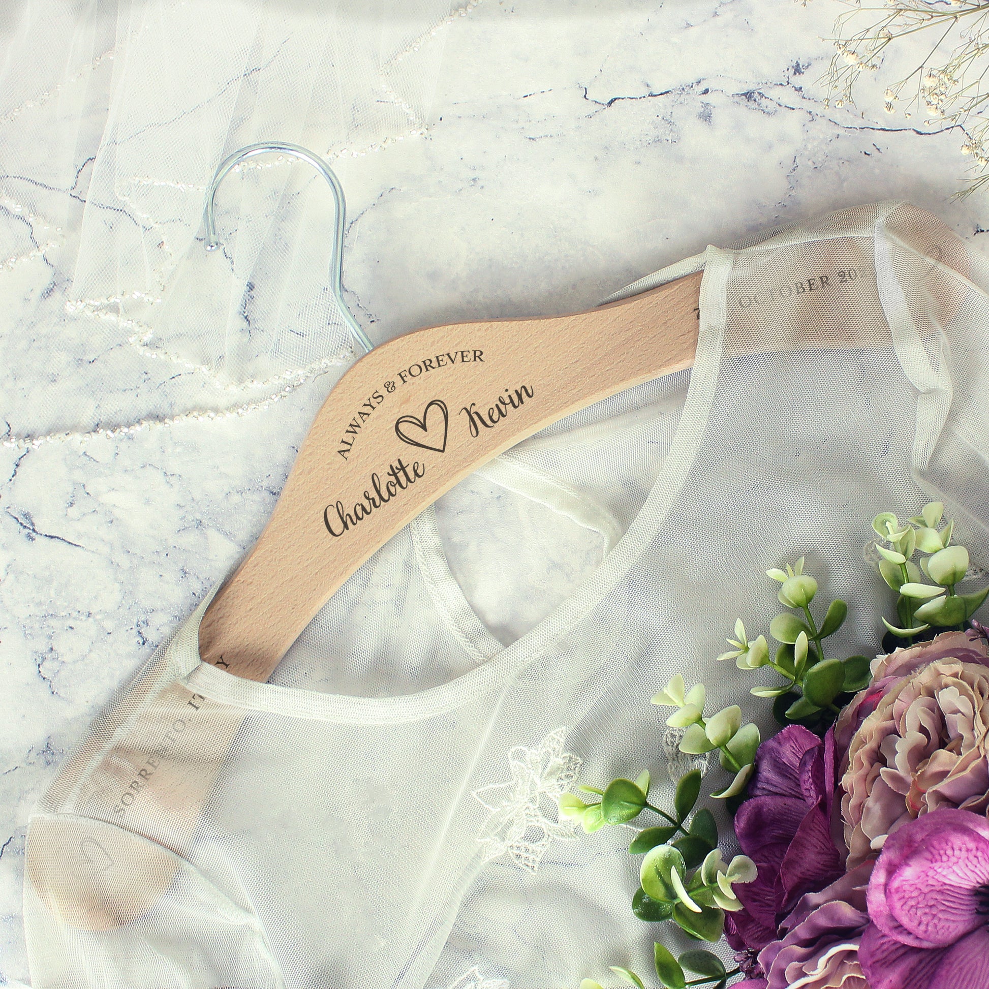 personalised wooden wedding hanger with Bride & Groom's names under the words "Always and Forever" and with a pretty sketched heart between the names. Room for further personalisation on each arm of the hanger.
