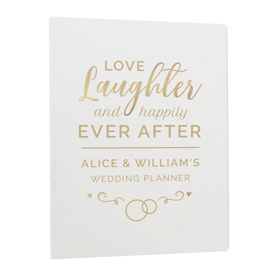 Love, Laughter and happily ever after wedding planner, personalised with the couple's first names. A ring bound planner with lots of useful content.