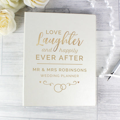 Personalised wedding planner with the words Love Laughter and Happily Ever After, personalised with the couple's first names