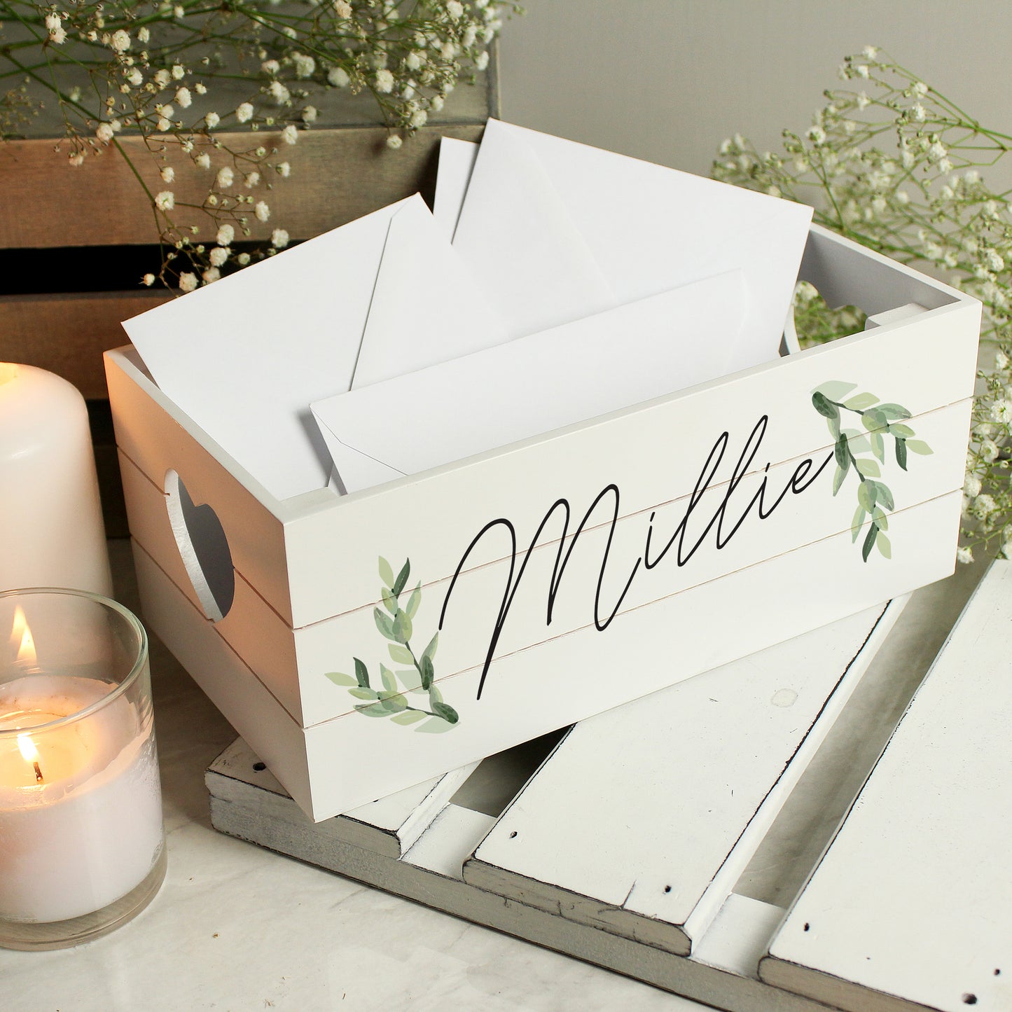 Small white wooden crate with heart shaped handles, personalised with name of your choice in script font