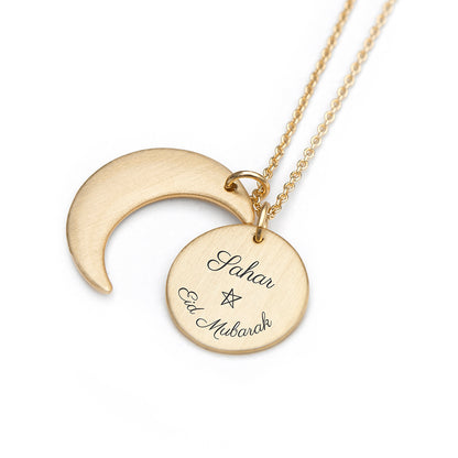 Gold plated Eid Mubarak Sun and Moon necklace. Engraved with Eid Mubarak . Personalise with engraved name.