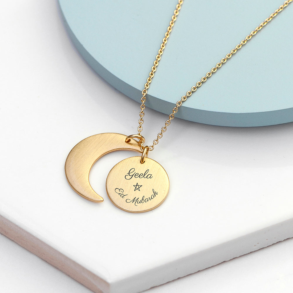 Gold plated Eid Mubarak Sun and Moon necklace. Engraved with Eid Mubarak . Personalise with engraved name.