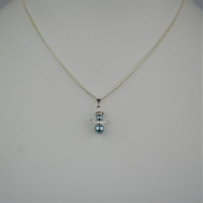 Snow angel pendant in pale blue pearl on a 16" silver plated chain