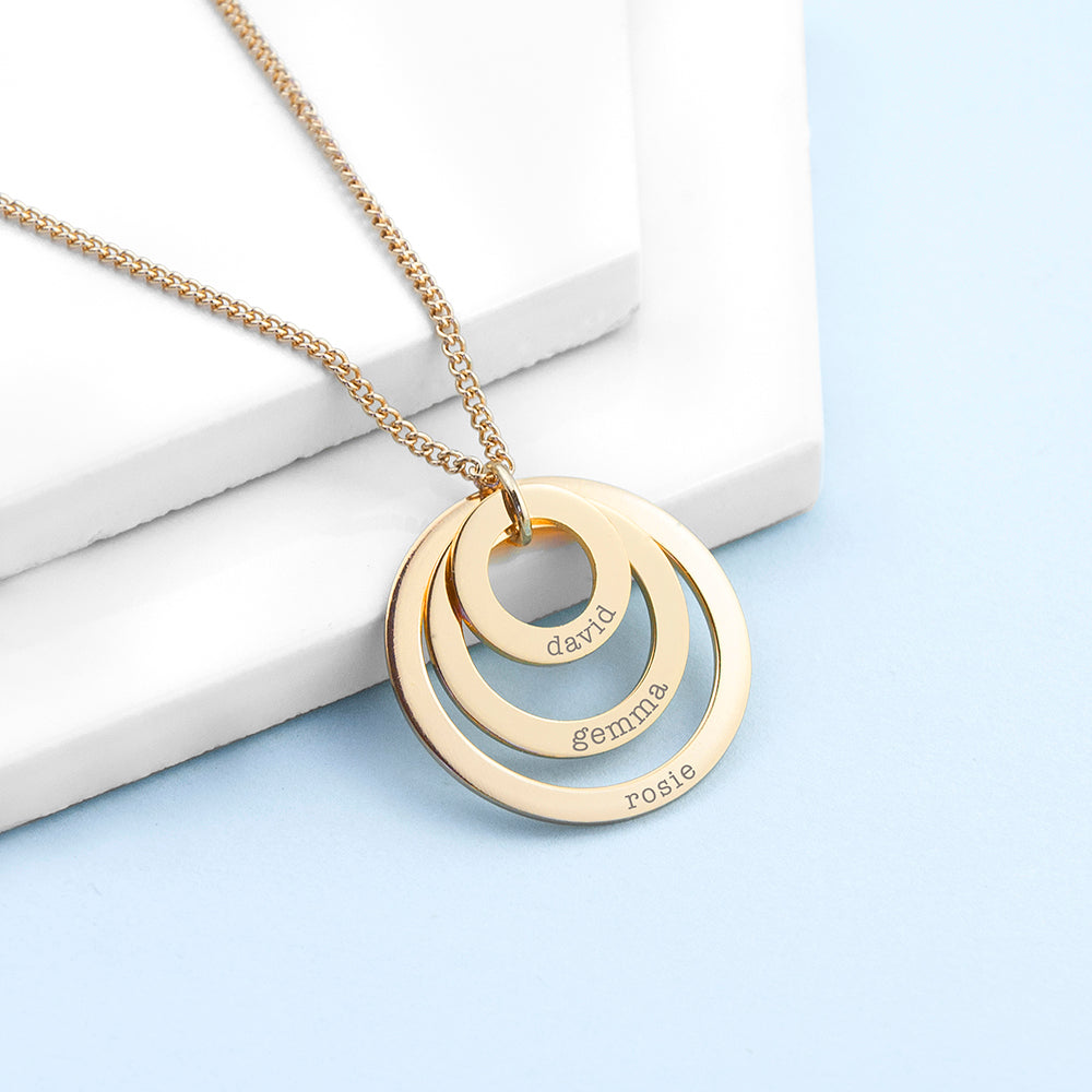 Three ring necklace shown in gold finish, each graduating-sized ring bears an engraved name of your choice,
