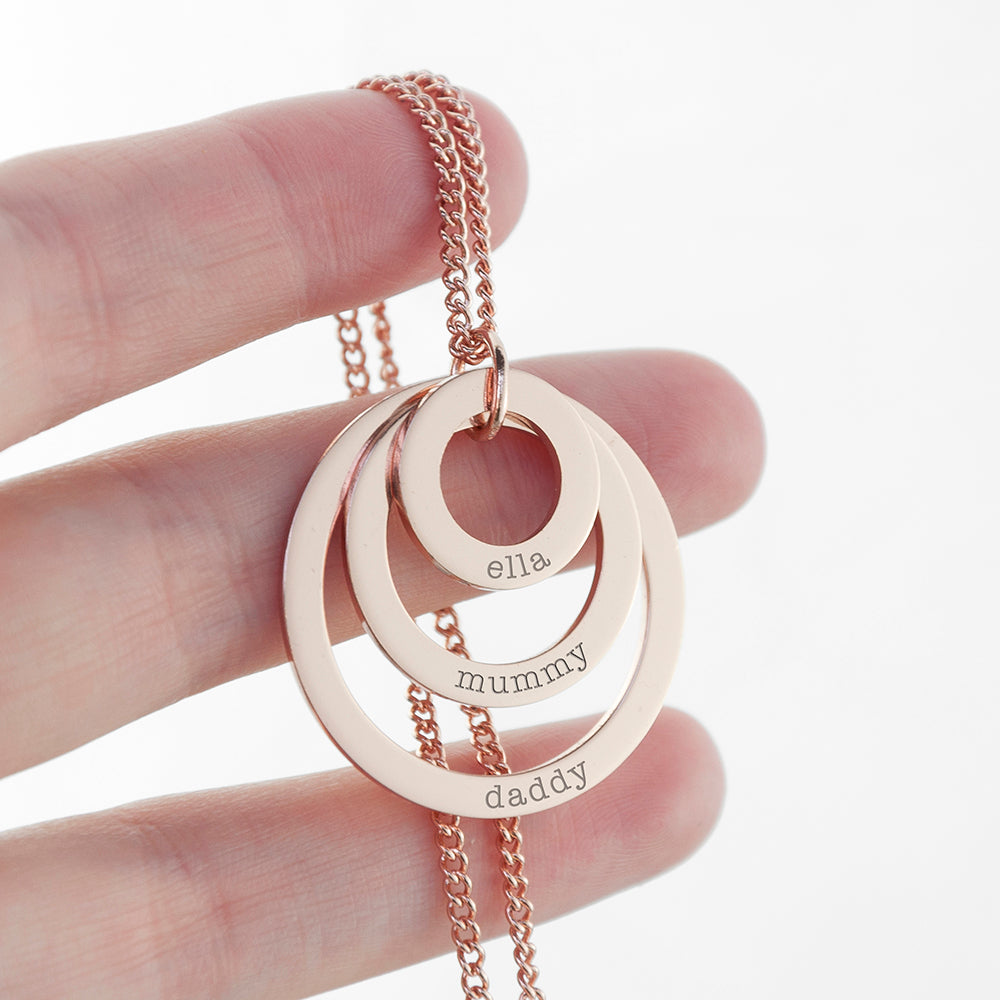 Three ring necklace shown in rose gold finish, each graduating-sized ring bears an engraved name of your choice,