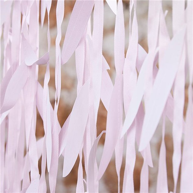 close up of ribbon curtain with willow shaped leaves